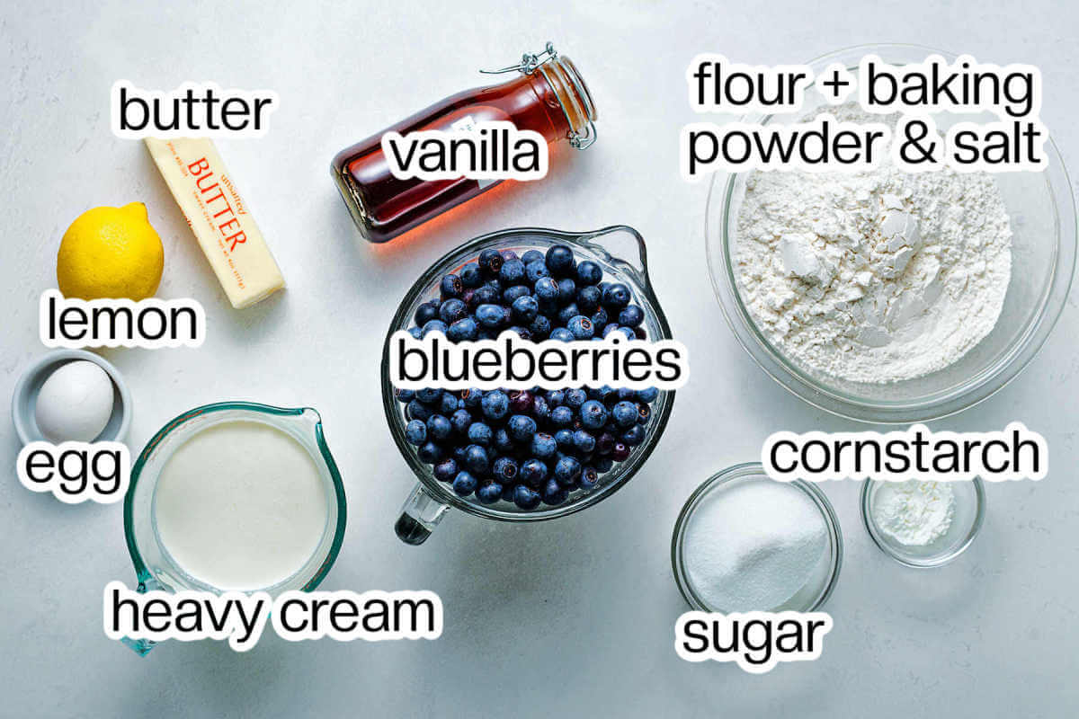 ingredients for blueberry shortcakes on a table.