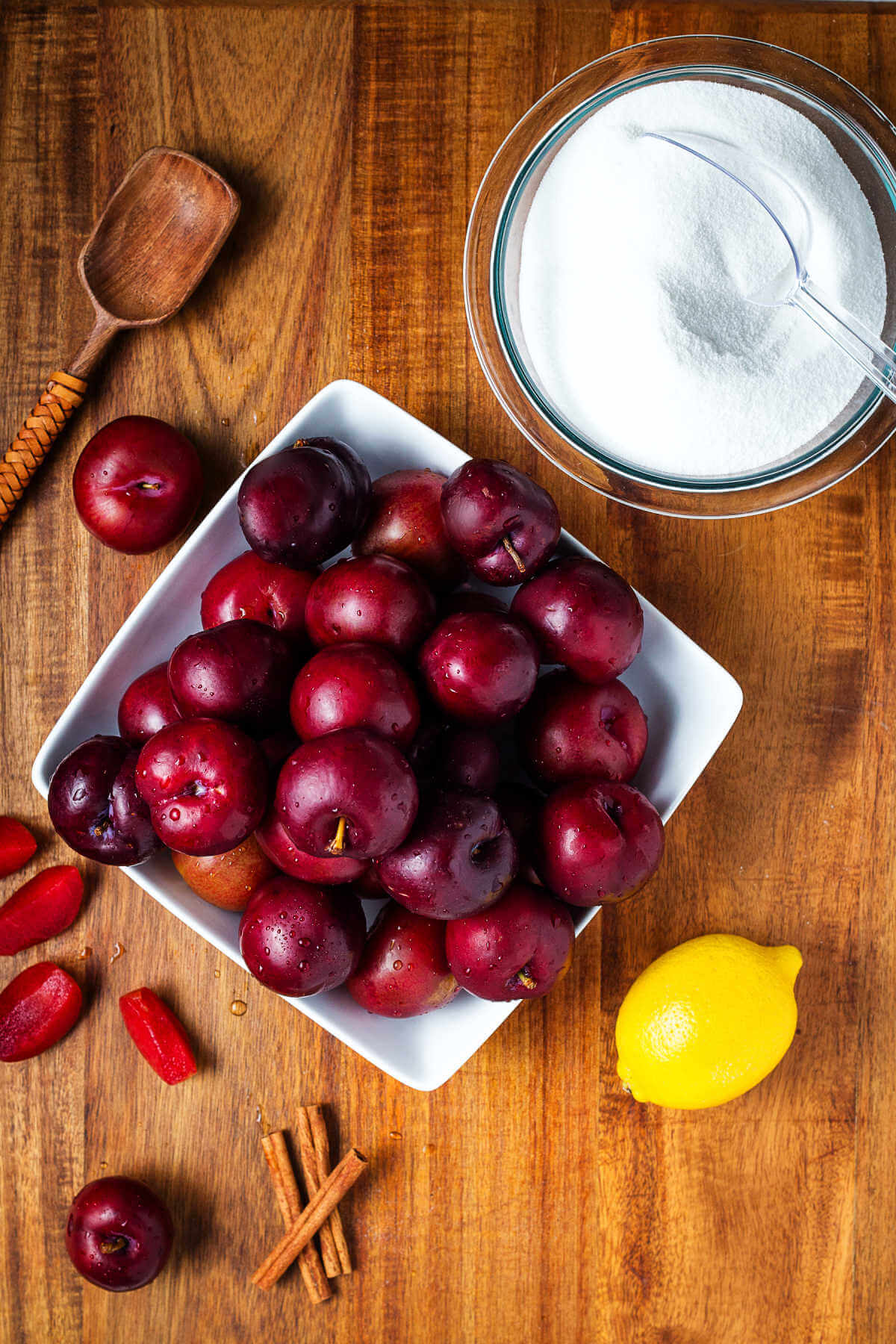 ingredients for plum jam on a table.