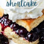 Blueberry Shortcake with whipped cream on a plate.