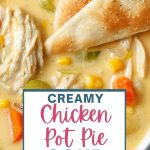 Chicken Pot Pie Soup with pie crust crackers in a bowl on a table.