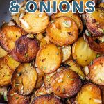 FRIED POTATOES AND ONIONS IN A SKILLET.