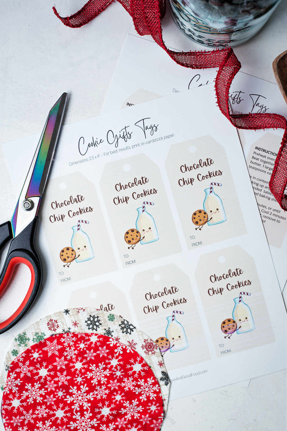 fabric and gift tag with scissors for cookie mix on a table.