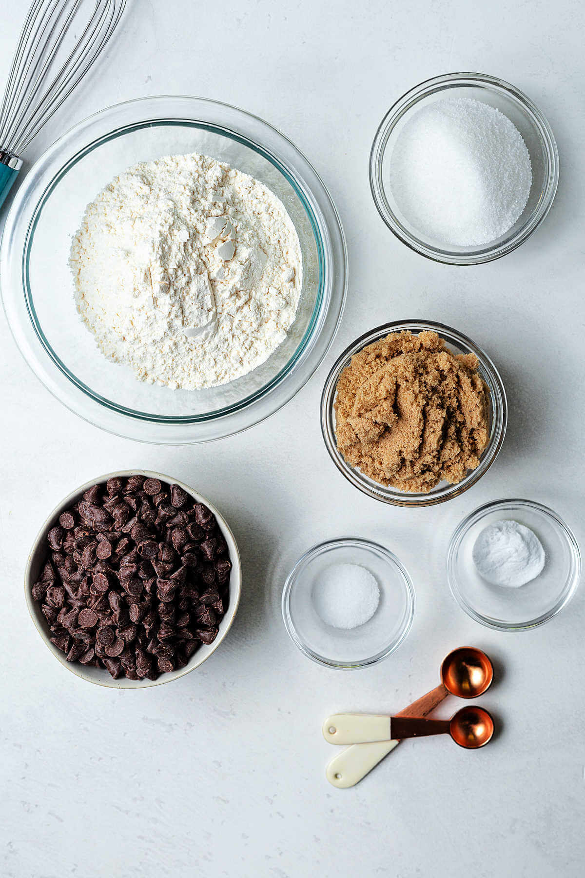 ingredients for chocolate chip cookie mix on a table.