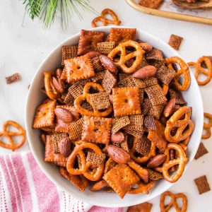 a bowl of Chex Mix on a table.