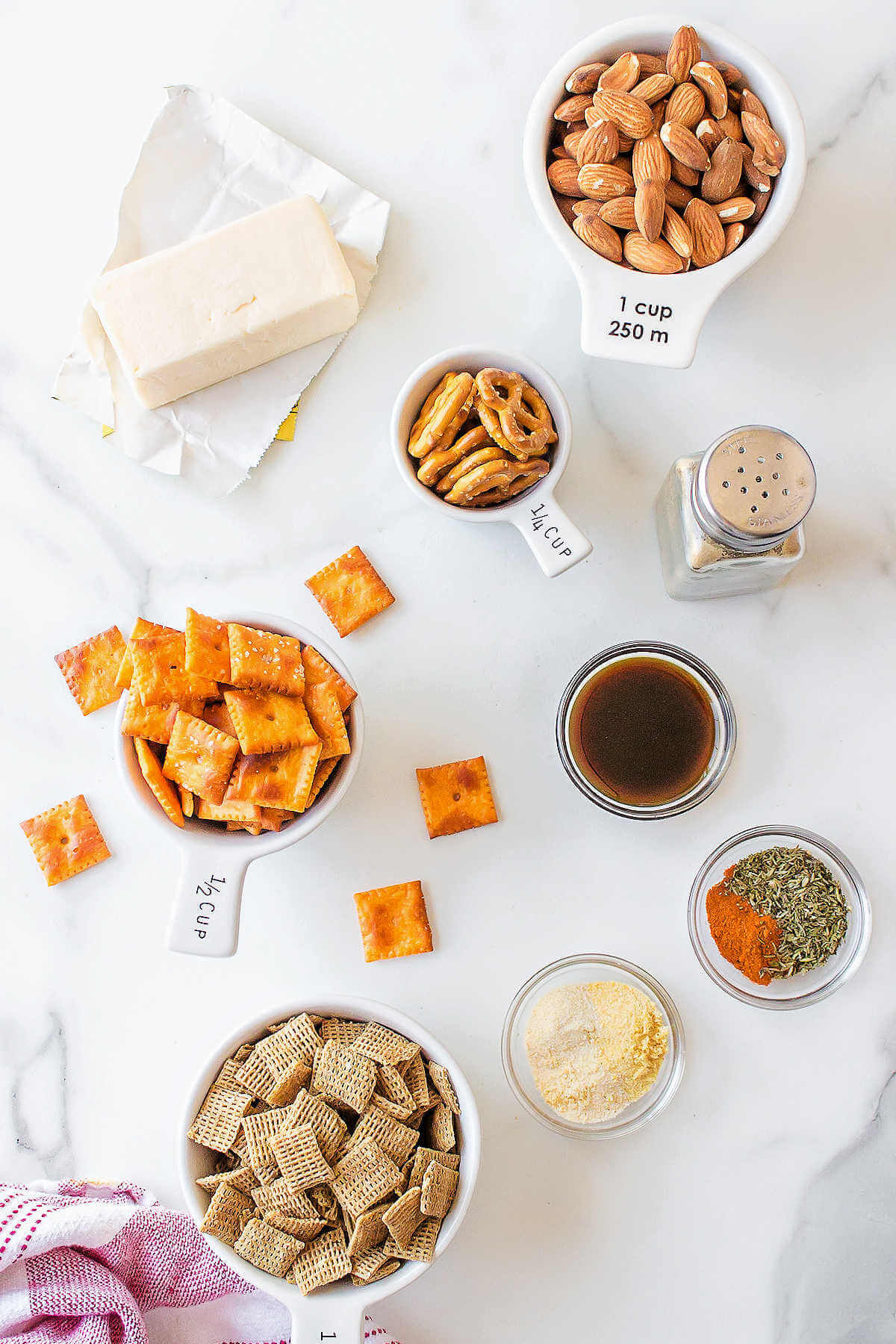 ingredients for Chex mix on a table.