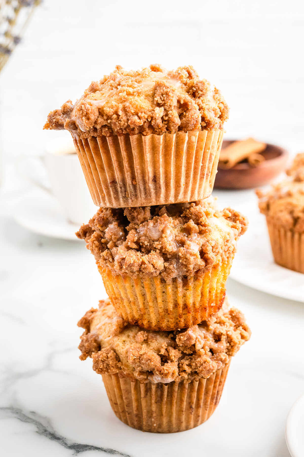 coffee cake muffins stacked on top of each other.