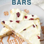 Cranberry Bliss Bars on a serving plate.