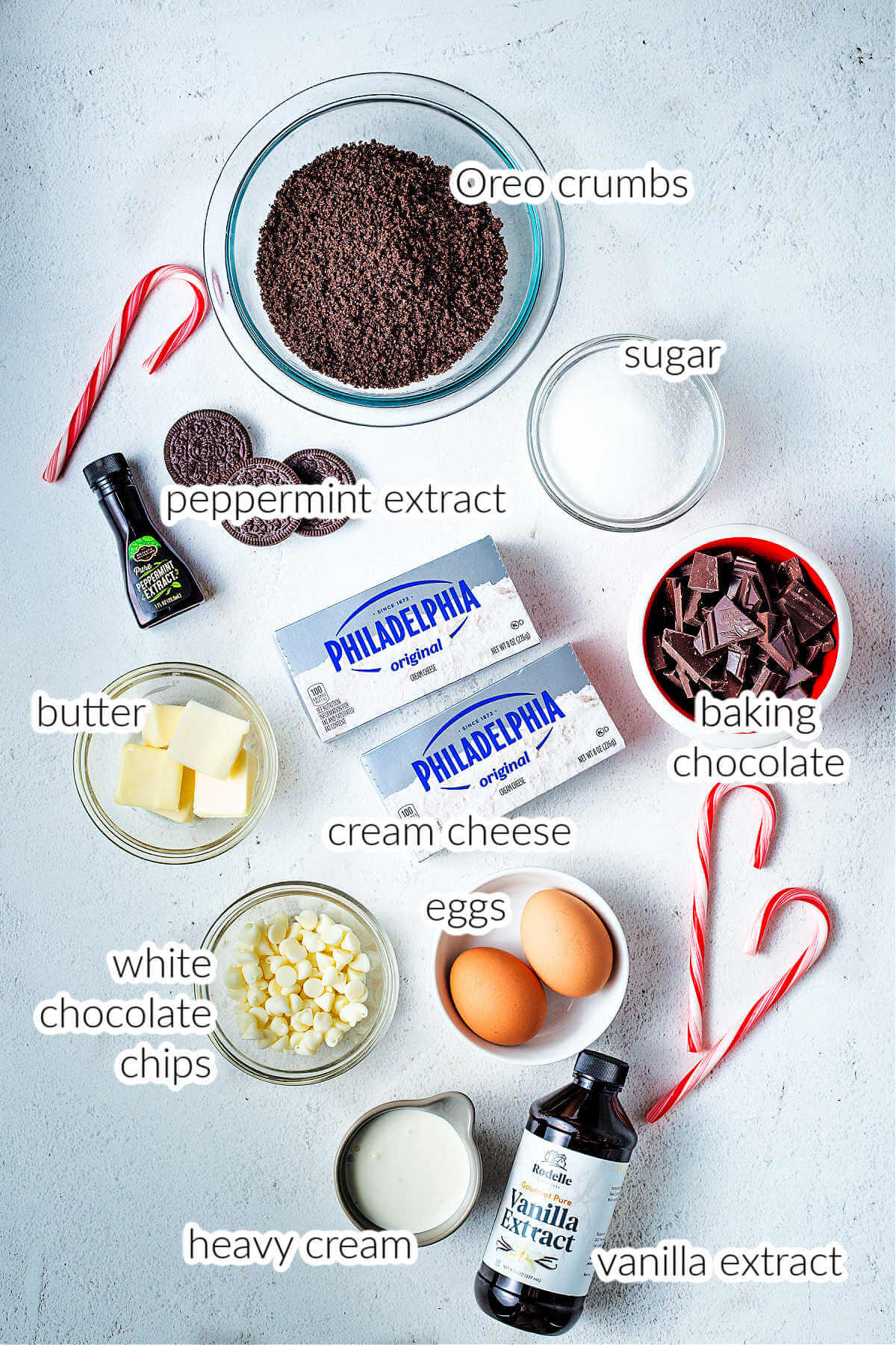 ingredients for peppermint cheesecake bars on a table.