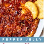Pepper Jelly Cream Cheese Dip with Bacon in a serving dish with crackers.