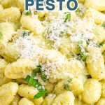 Gnocchi with Homemade Creamy Basil Pesto Sauce in a serving bowl with grated parmesan cheese.