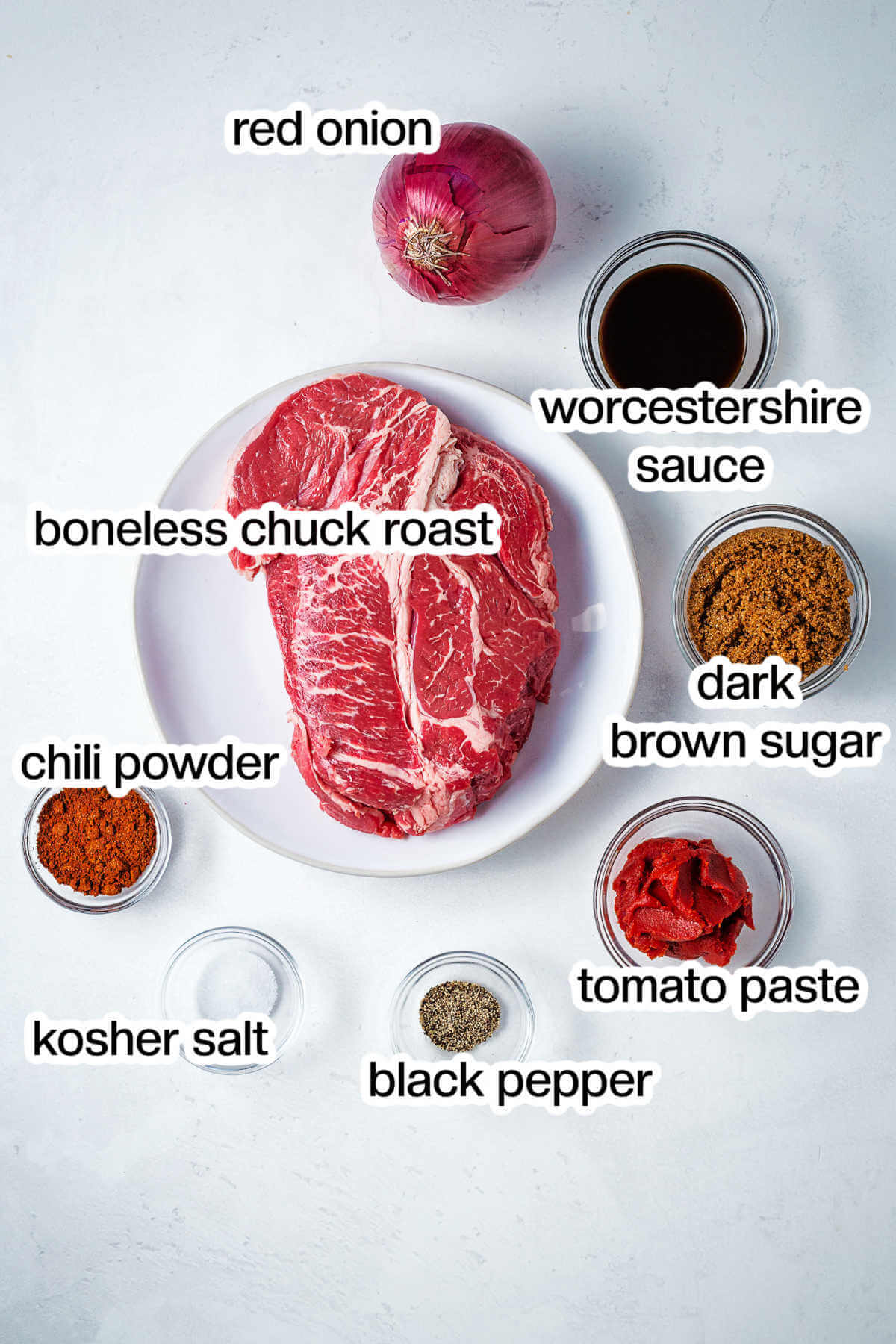 ingredients for slow cooker pulled beef on a table.