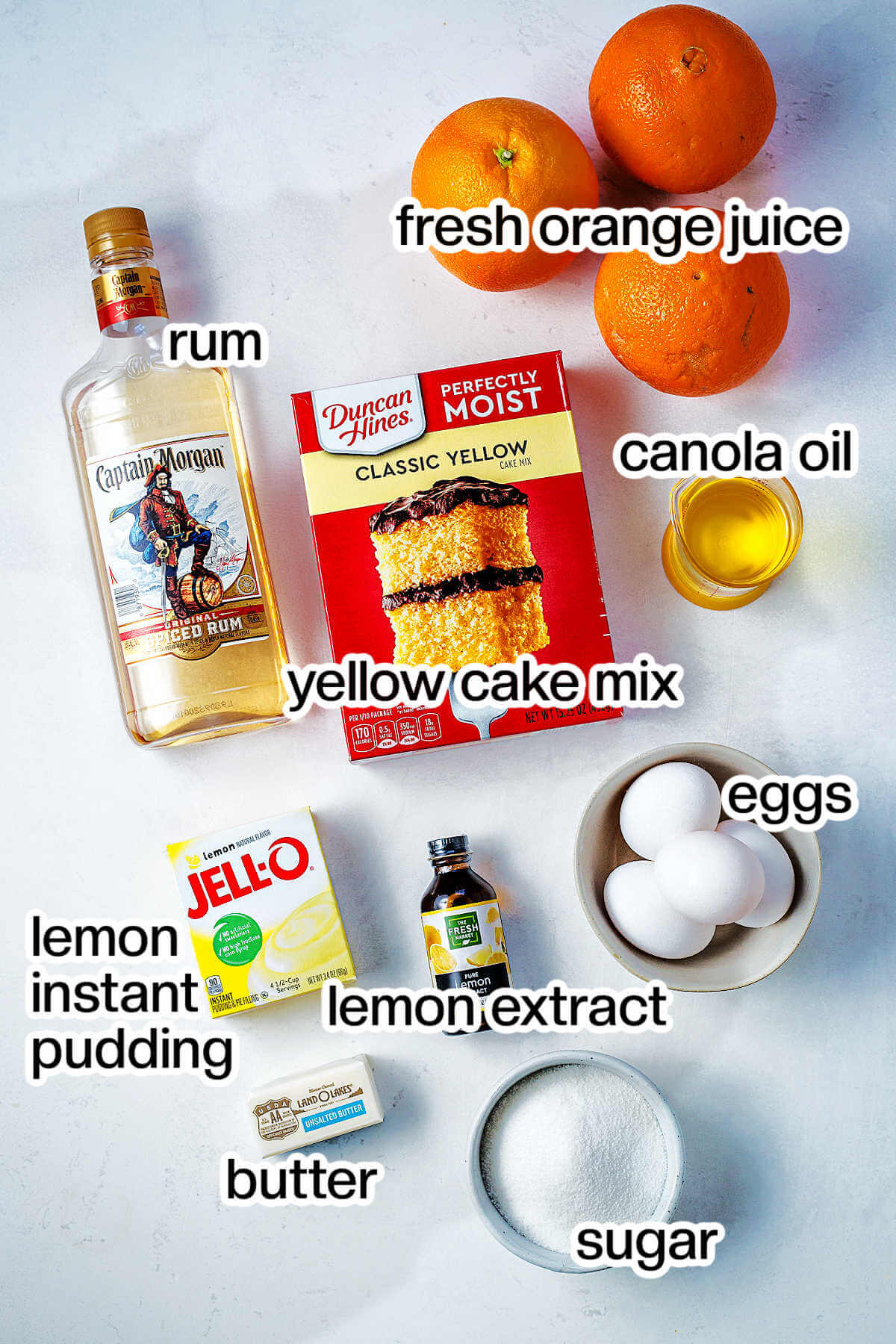 Ingredients for orange cake on a table.