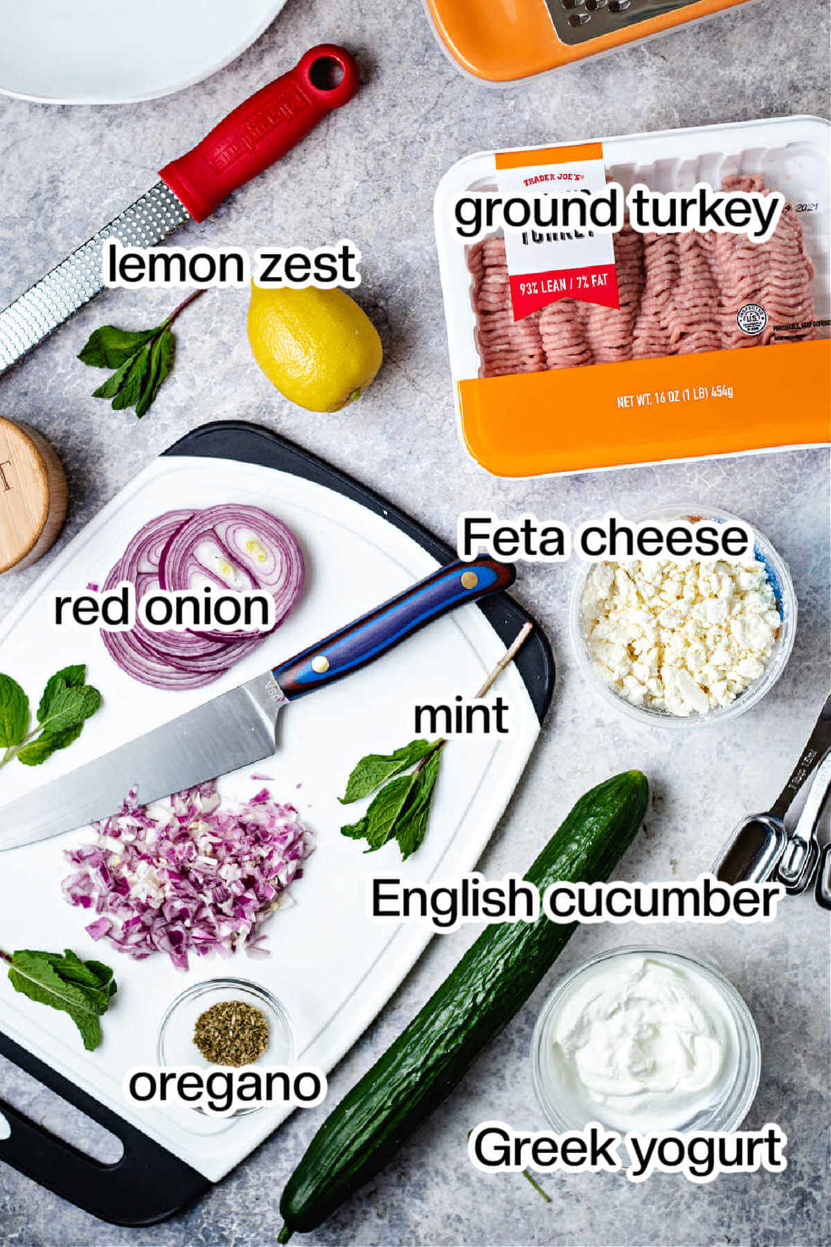 Ingredients for Greek Turkey Burgers on a table.