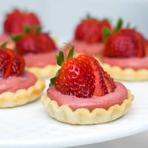 Mini Strawberry Tarts on a plate.