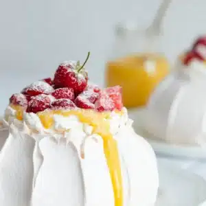 Strawberry Pavlova with Lemon Curd side view on a table.