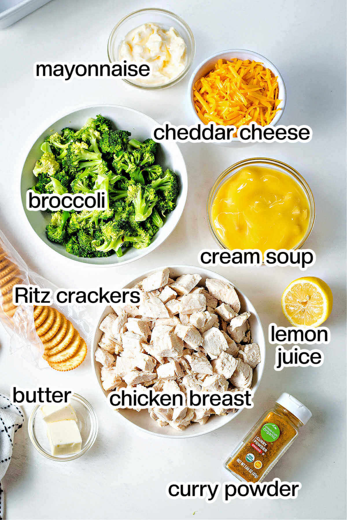 Ingredients for chicken broccoli casserole on a table.
