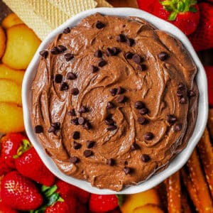 Brownie Batter Dip in a bowl garnished with mini chocolate chiips.