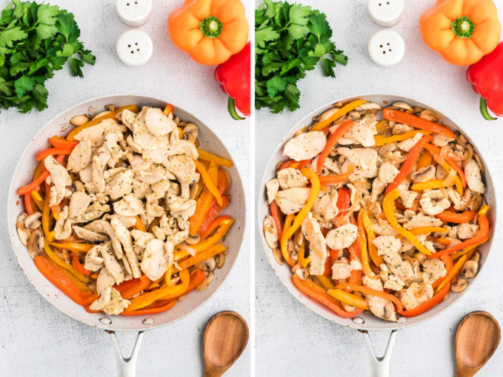 Cooked chicken with veggies in a skillet on a table.