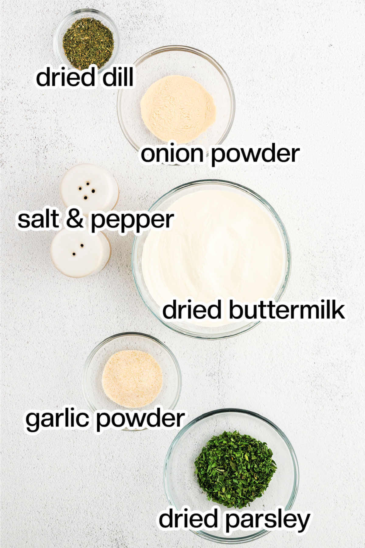 Ingredients for homemade ranch seasoning mix on a table.