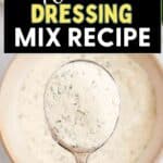 Ranch Dressing & Seasoning Mix in a bowl with a spoon on a table.