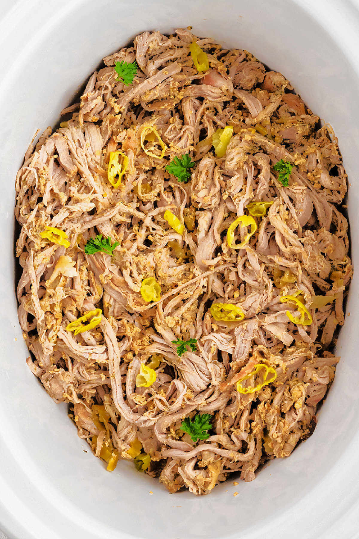 Shredded Mississippi Pork Roast in a crockpot.