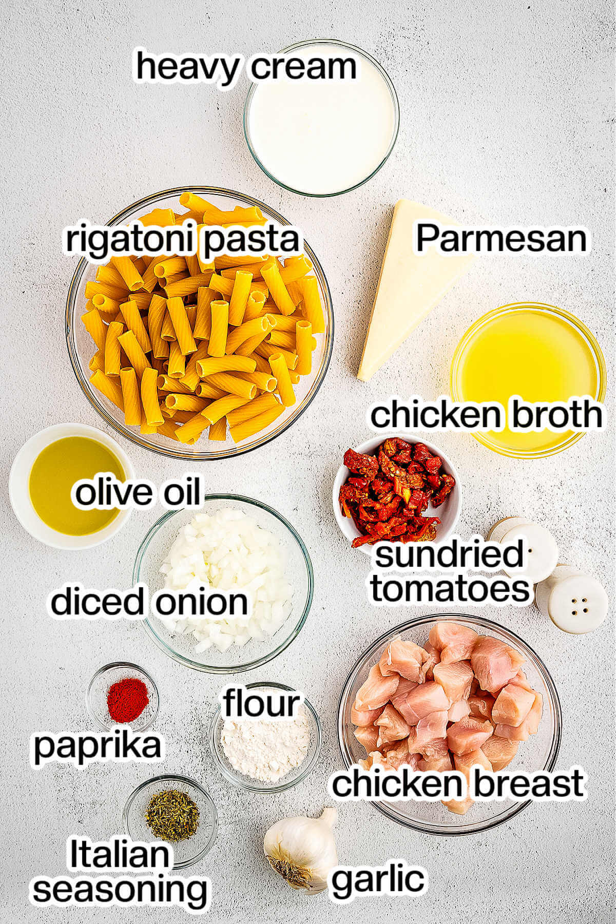 Ingredients for Marry Me Chicken Pasta on a table.