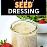 Pouring Creamy Poppy Seed Dressing on a bowl of salad.