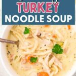 Creamy Turkey Noodle Soup in a bowl on a table.