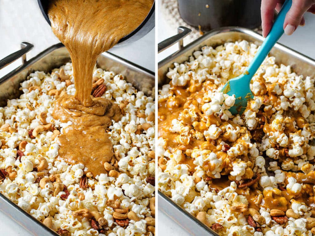 Pouring caramel sauce over popcorn and stirring with a silicone spatula to coat the pieces before baking.