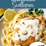 Scaloppine Al Limone on a bed of linguine with lemon slices.