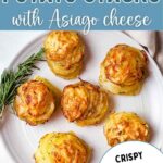 Cheesy and Crispy Muffin Tin Potato Stacks on a plate garnished with fresh rosemary.