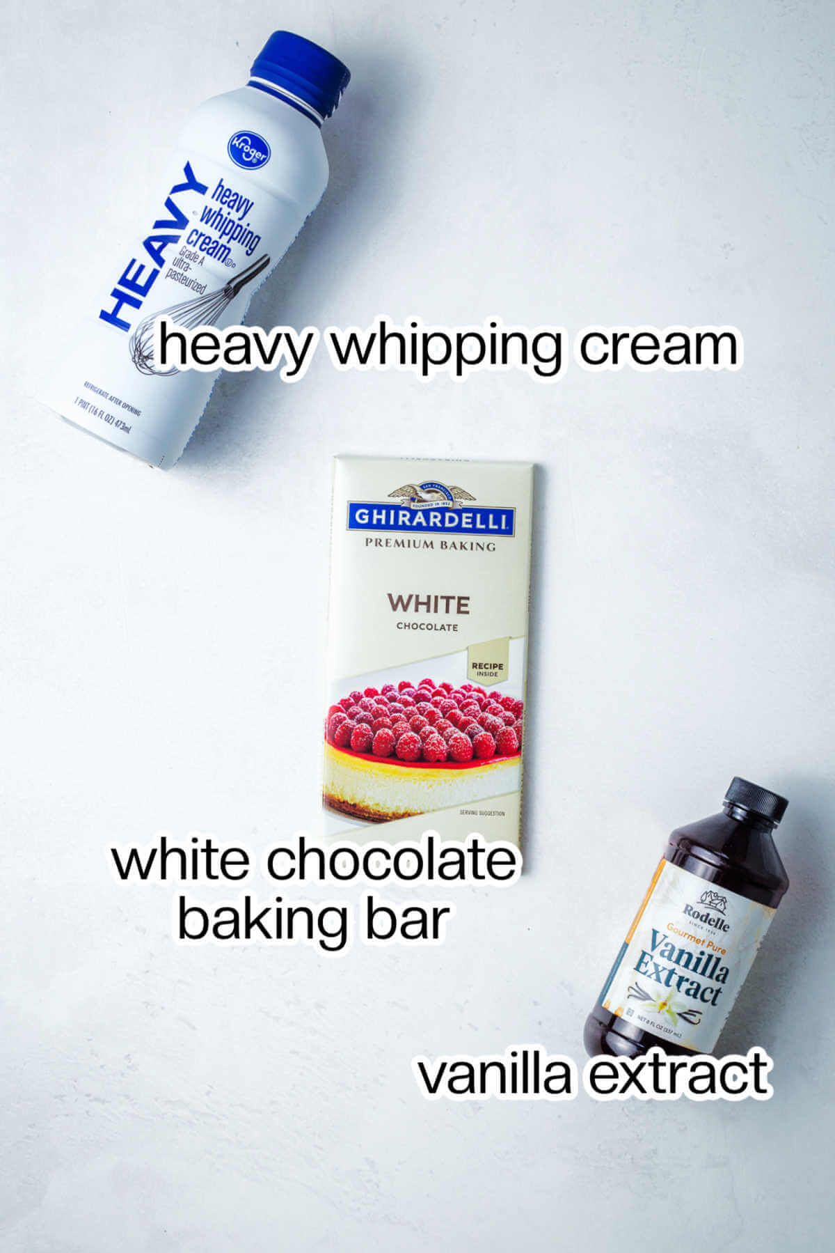 Ingredients for white chocolate mousse on a table.