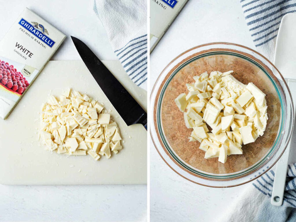 A white chocolate baking bar chopped into pieces on a cutting board and in a glass bowl.