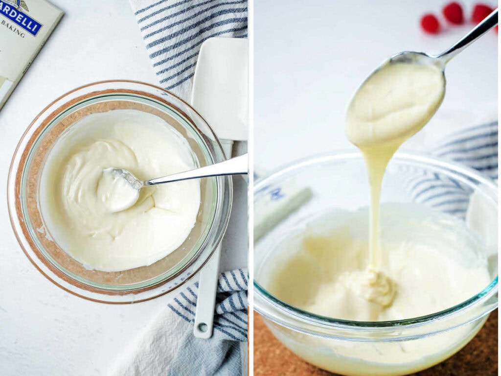 Melted white chocolate in a glass bowl with a spoon on a table.