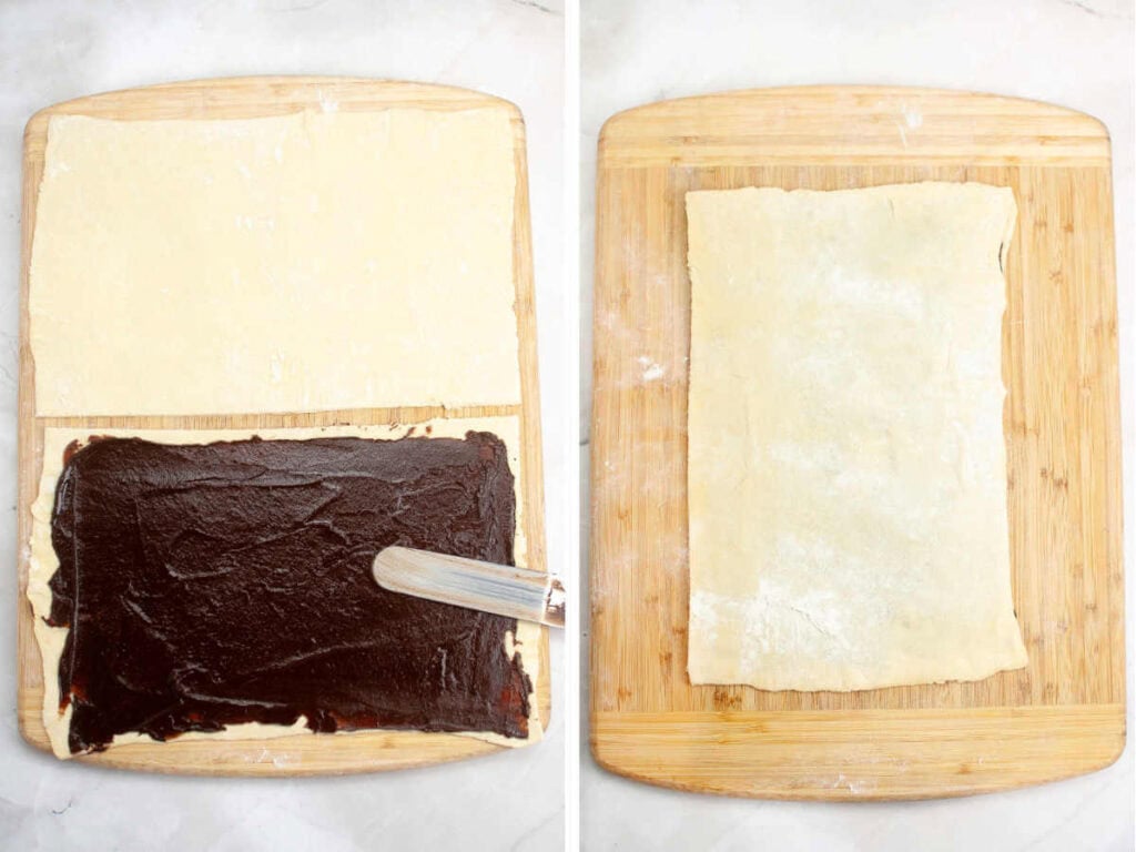 Puff pastry dough sheet cut in half, then spread with melted chocolate with an offset spatula.