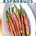 Crispy Prosciutto-Wrapped Roasted Asparagus in a serving dish.