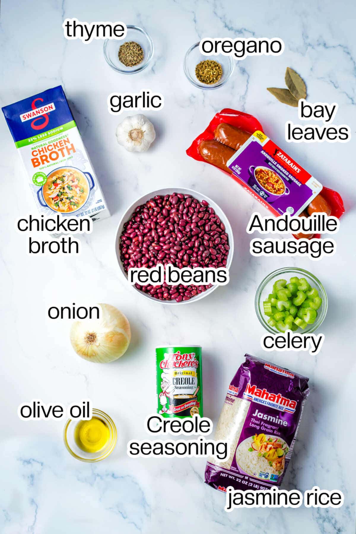 Ingredients for red beans and rice on a table.