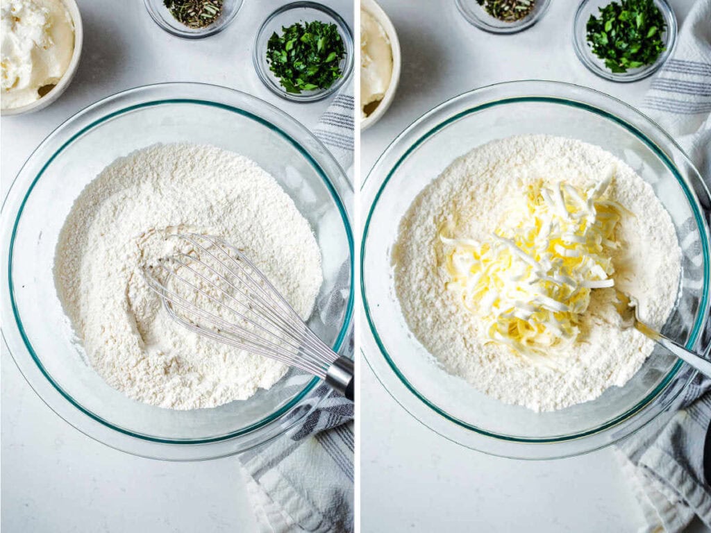 Whisking flour with leavening agents in a glass bowl; butter grated into a bowl with flour.