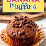 Chocolate Banana Muffin in a paper liner on a napkin.