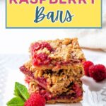 Raspberry Crumb Bars stacked on a plate.