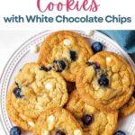 Blueberry Cookies with White Chocolate Chips stacked on a plate.