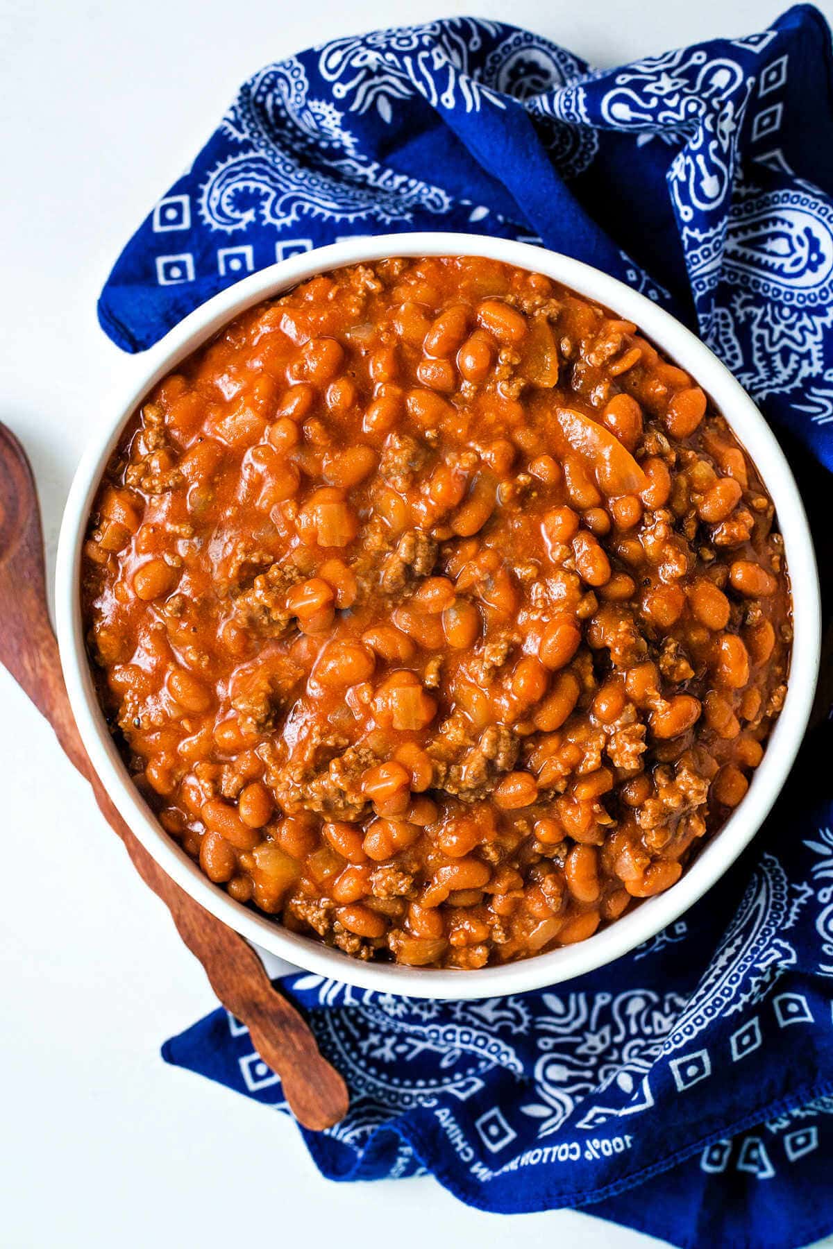 Overhead shot of slow cooker cowboy beans in a bowl.