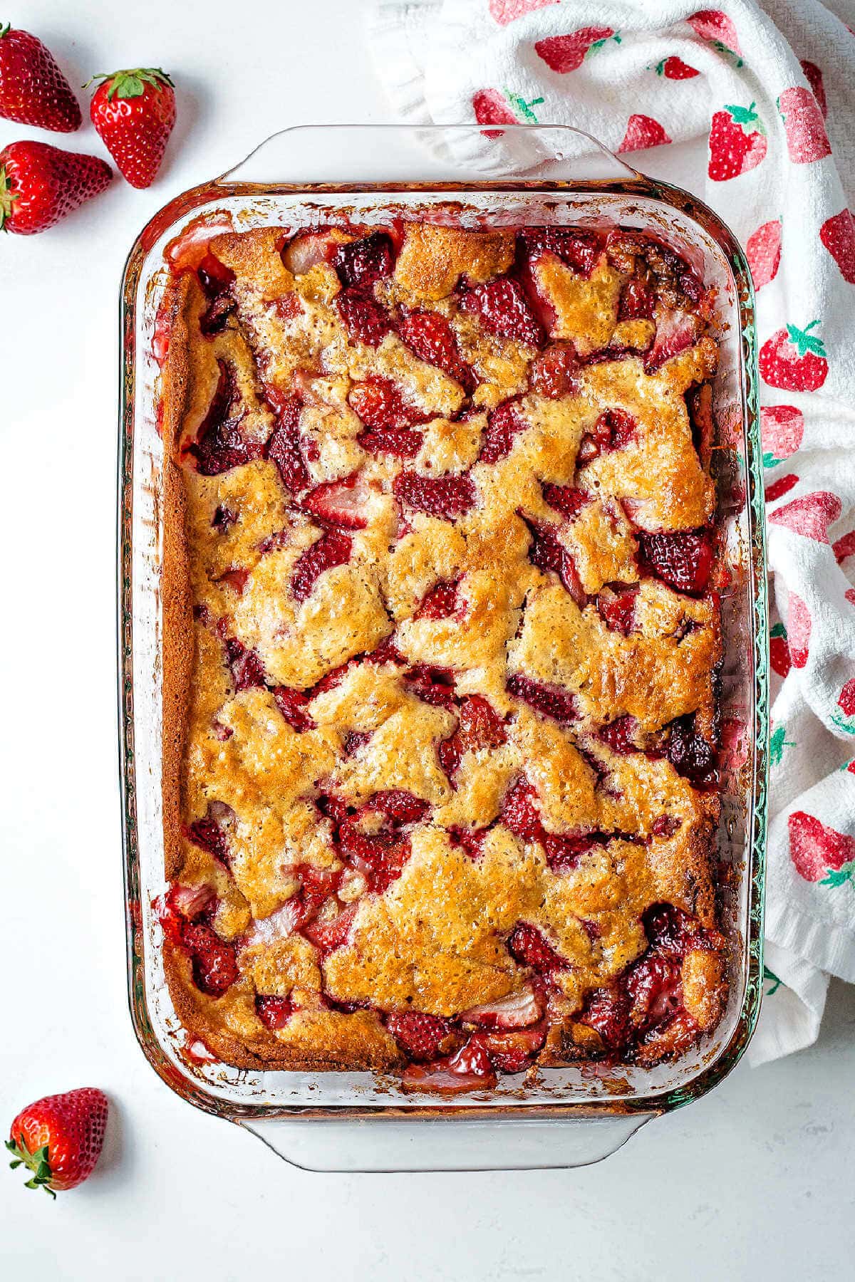 Overhead shot of strawberry cobbler after baking.