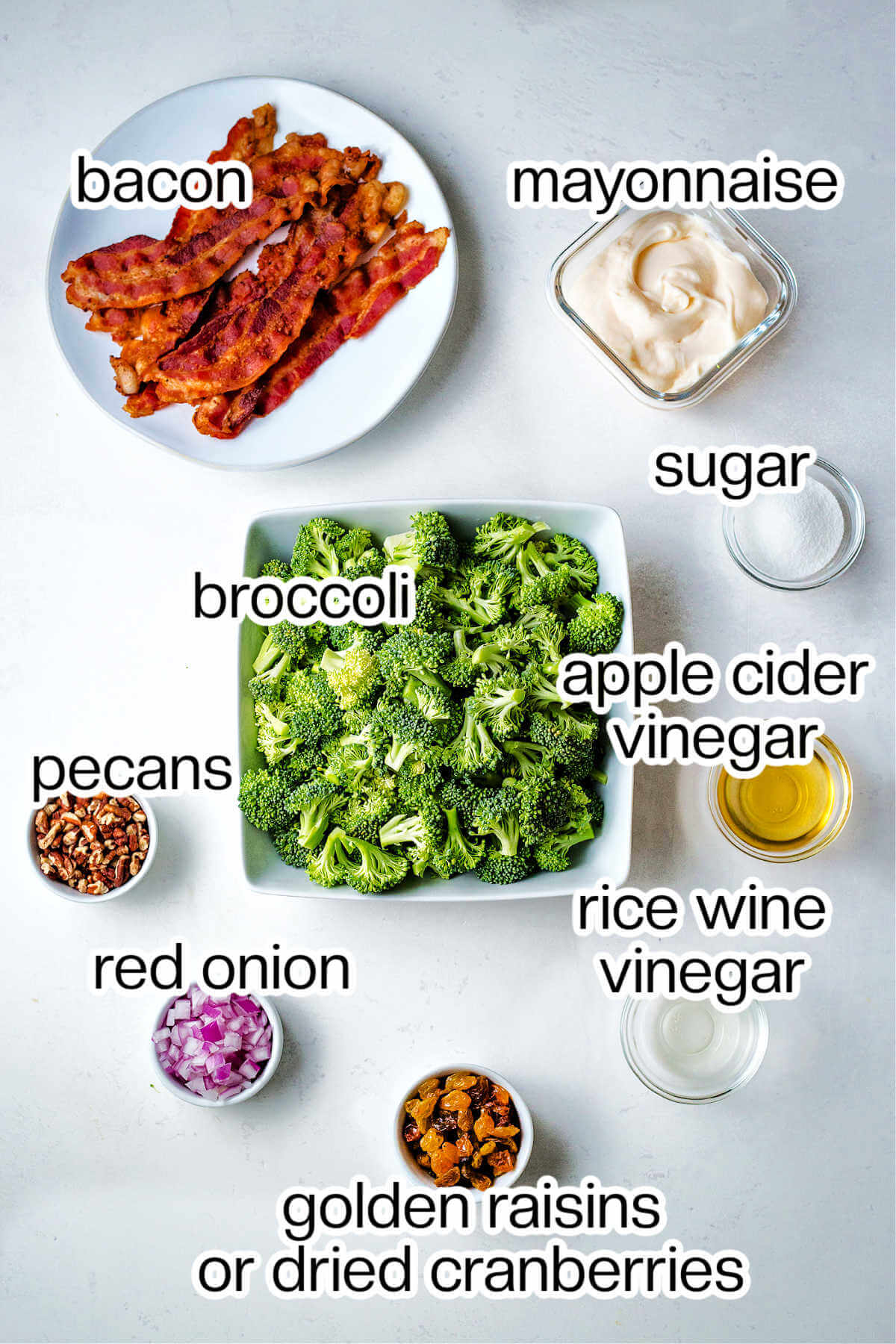 Ingredients for broccoli salad on a table.