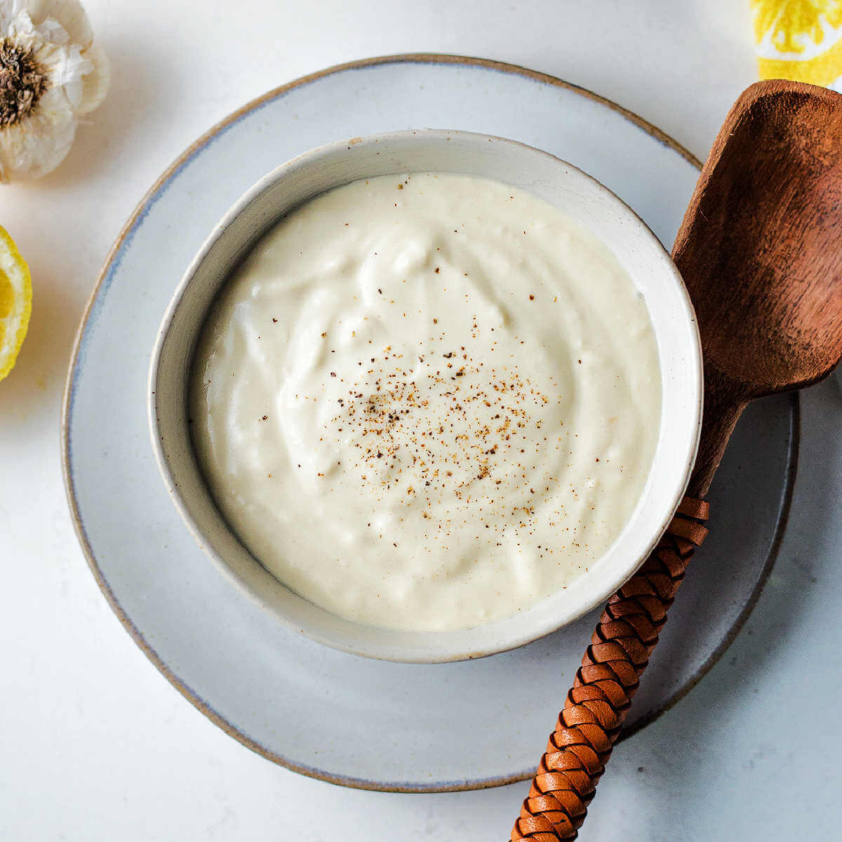 Greek yogurt caesar salad dressing in a bowl.