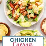 Blackened Chicken Caesar Salad on a plate on a table.