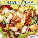 Blackened Chicken Caesar Salad on a plate on a table.