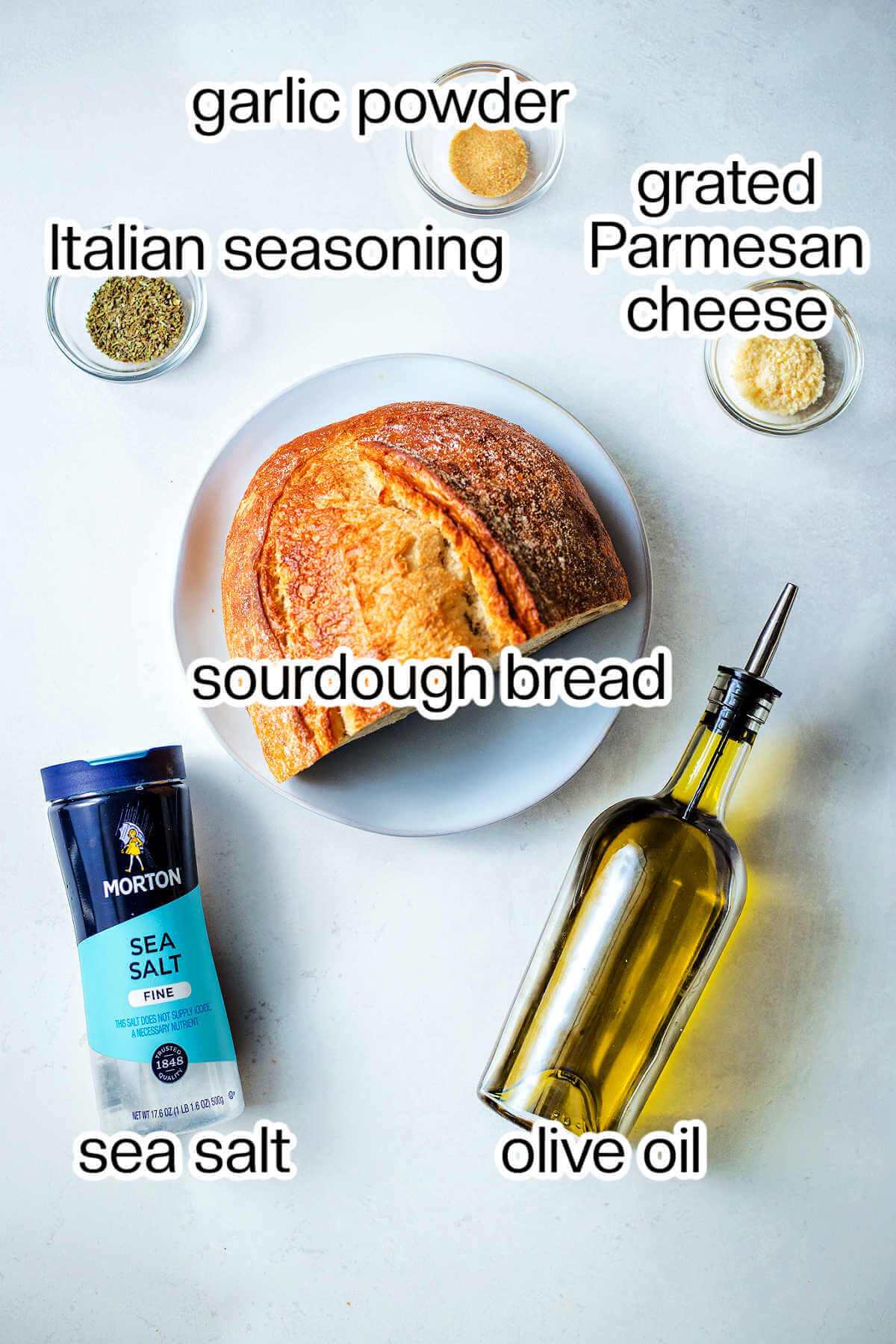 Labeled photo of the ingredients needed to make air fryer croutons.