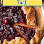 Rustic Cherry Tart (Cherry Galette) on a wooden board.