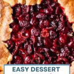 Rustic Cherry Tart (Cherry Galette) on a wooden board.